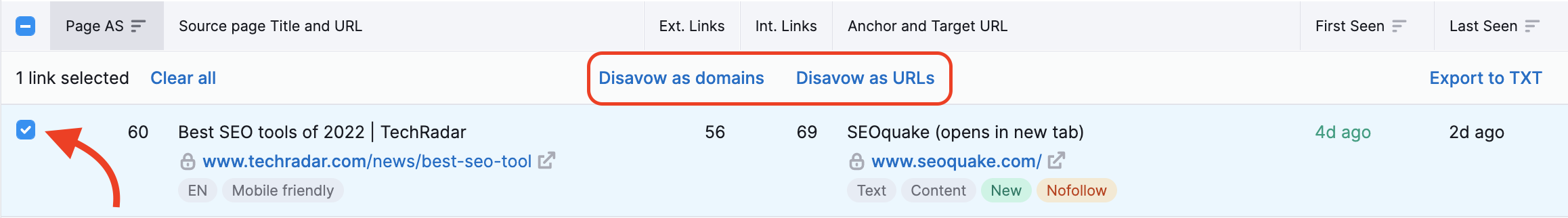 A red arrow is pointing to the select box and the Disavow as domains and Disavow as URLs buttons are highlighted above the selected backlink.